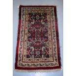 Amritsar rug, north India, early 20th century, 2ft. 9in. x 1ft. 7in. 0.84m. x 0.48m. Some wear and