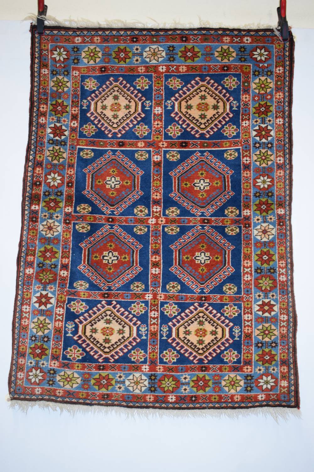 Yalameh compartment rug, south west Persia, circa 1930s; 4ft. 10in. x 3ft. 6in. 1.47m. x 1.07m.