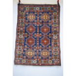 Yalameh compartment rug, south west Persia, circa 1930s; 4ft. 10in. x 3ft. 6in. 1.47m. x 1.07m.