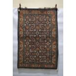 Mahal rug, north west Persia, mid-20th century, 5ft. 5in. x 3ft. 7in. 1.65m. x 1.09m. Reweave to