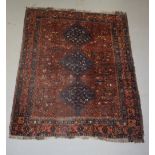 Khamseh carpet, Fars, south west Persia, circa 1920s 7ft. 1in. x 5ft. 6in. 2.16m. x 1.68m. Overall