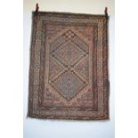 Hamadan rug, north west Persia, circa 1930s, 4ft. 10in. x 3ft. 7in. 1.47m. x 1.09m. Overall wear,