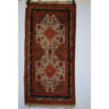 Khotan rug, Xinjiang, east Turkestan, circa 1930s, 5ft. 9in. x 3ft. 1.75m. x 0.91m.