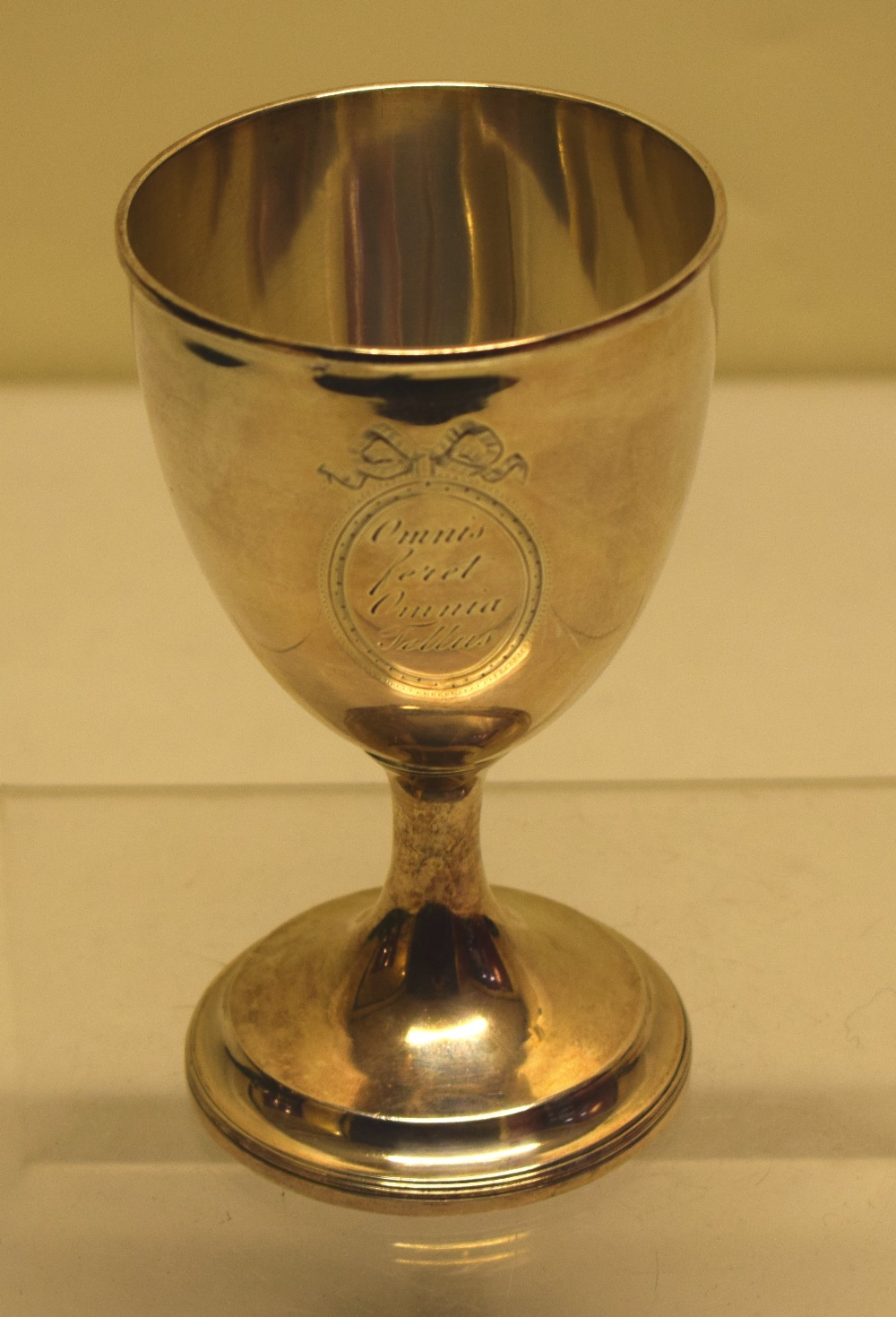 A George III silver wine goblet, the bowl with a Latin inscription in an oval cartouche, on a reeded