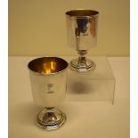 A pair of early Victorian silver goblets, the bowls engraved a Barons coronet above a crest,