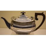 A late Victorian silver rectangular teapot, with a swan neck spout, hinged lid with detachable ebony