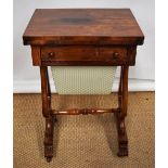 A William IV rosewood games and work table, the veneered swivelling fold over flap top lined with