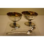 A pair of George III Irish silver oval salts, gilded inside, engraved a star crest and initials,