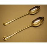 A pair of late Victorian basting spoons,