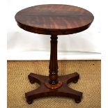 A William IV rosewood veneered occasional table, the circular top on a turned and ribbed flared
