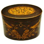 A late eighteenth century oval tea caddy, veneered in partridge wood, the hinged lid inlaid a