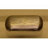 A George III silver snuff box of reeded trunk form, a gilded interior. 3in (7.5cm) Maker John Reily,