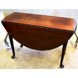 An eighteenth century Cuban mahogany gateleg table, the oval drop leaf top with an egg and dart