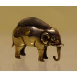 An Edwardian novelty silver pin cushion of an elephant. 1.75in (4.25cm) Makers Stokes and Ireland,