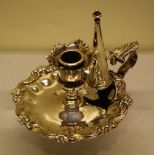 A William IV silver chamber candlestick, in Rococo Revival style, the raised moulded raised sided