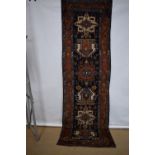 Attractive Karaja runner, north west Persia, circa 1920s, 10ft. 11in. X 3ft. 4in. 3.33m. X 1.02m.