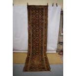 Malayer runner, north west Persia, circa 1930s, 13ft. X 3ft. 3in. 3.96m. X 1m. Overall wear, heavy