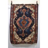 Bijar ghileem, north west Persia, circa 1920s, 5ft. 5in. X 3ft. 9in. 1.65m. X 1.14m. Some wear; some