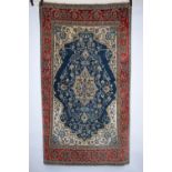 Qum rug, south central Persia, mid-20th century, 7ft. 6in. X 4ft. 4in. 2.29m. X 1.32m. Dark blue