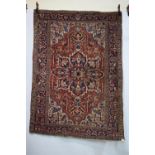 Heriz rug, north west Persia, circa 1930s, 6ft. 7in. X 4ft. 8in. 2.01m. X 1.42m. Slight loss to