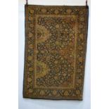 Kashan rug, west Persia, circa 1920s-30s, 6ft. 7in. X 4ft. 6in. 2.01m. X 1.37m. Overall wear,