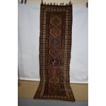 Karabakh runner, south west Caucasus, circa 1930s, 11ft. 11in. X 3ft. 6in. 3.63m. X 1.07m. Overall
