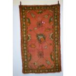 Ushak rug, west Anatolia, late 19th century, 7ft. 8in. X 4ft. 6in. 2.34m. X 1.37m. Overall wear,