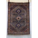 Yalameh village rug, south west Persia, mid-20th century, 4ft. 10in. X 3ft. 4in. 1.47m. X 1.02m.