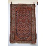 Feraghan rug, north west Persia, circa 1900, 6ft. 8in. X 4ft. 4in. 2.03m. X 1.32m. Overall wear;
