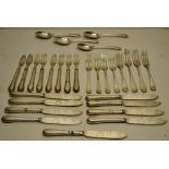 Nine Victorian silver fish knives and eight matching fish forks with engraved blades and loaded