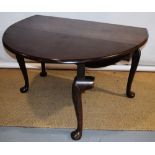 A George II Virginian walnut oval drop leaf dining table, on shell and pendant carved gatelegs to