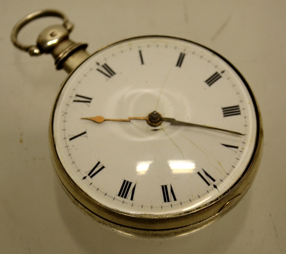 A Regency silver cased pocket watch, the lever movement with a finely engraved pierced watchcock,