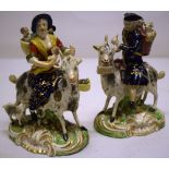 A pair of early nineteenth century Derby porcelain figures of Count Bruhl's tailor, his wife and