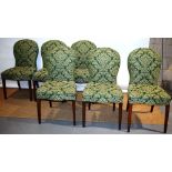 A set of six George III side chairs, the upholstered domed backs and seats covered in green