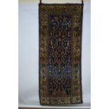 Malayer long rug, Hamadan area, north west Persia, early 20th century 8ft. 3in. X 3ft. 7in. 2.51m. X
