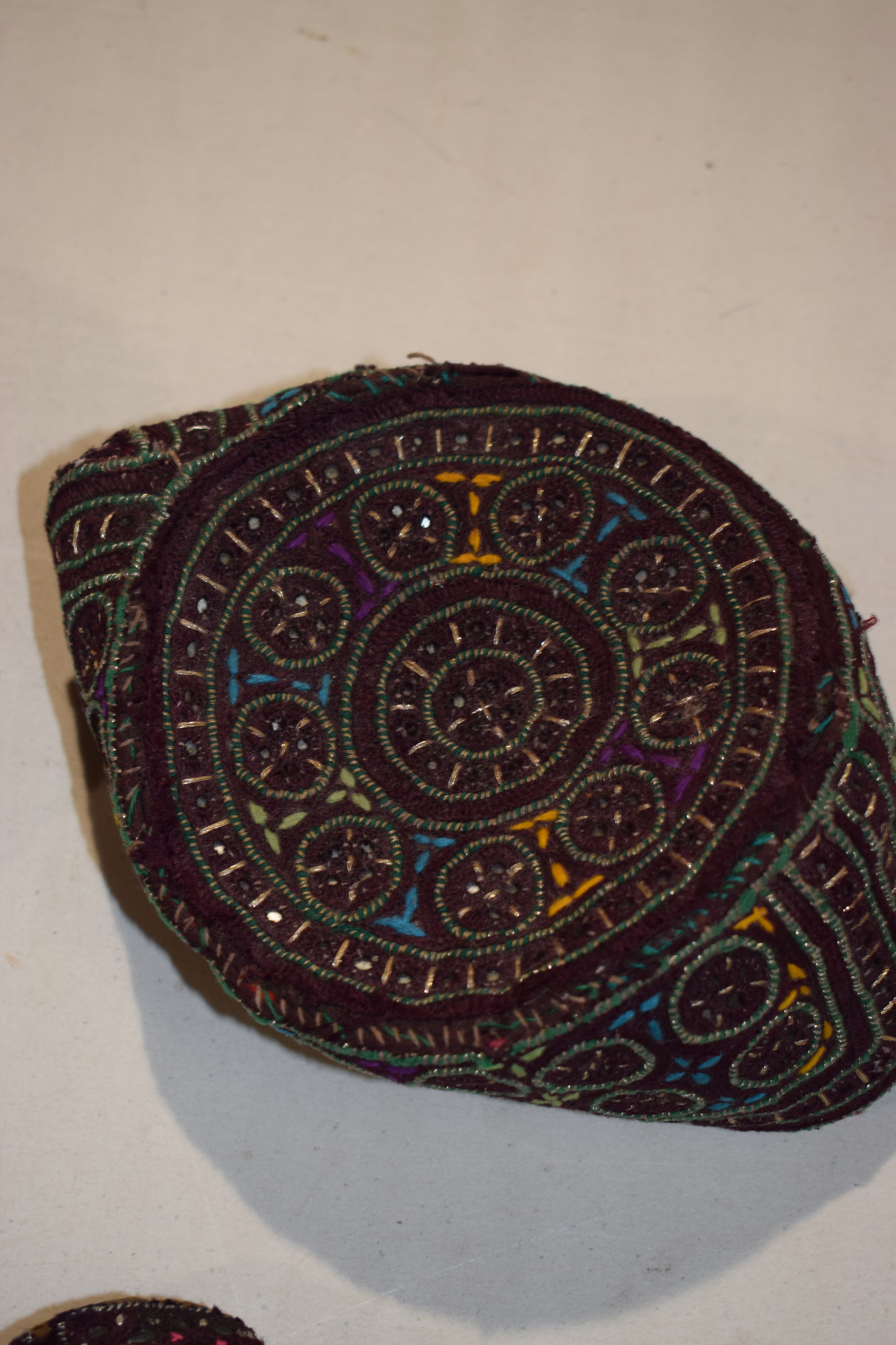 Six Sindhi Baluchi topi (caps), embroidered in coloured silks, metal threads and shisha-work ( - Image 5 of 30
