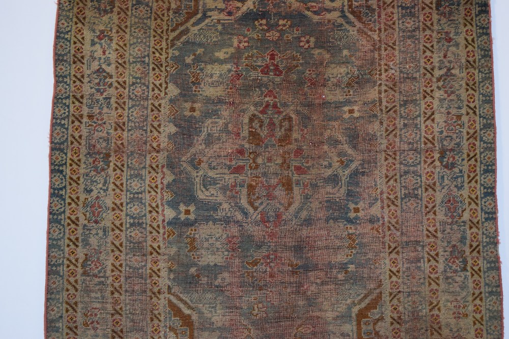 Melas rug, west Anatolia, 19th century, 5ft. 6in. X 3ft. 10in. 1.68m. X 1.17m. Overall wear, heavy - Image 5 of 11