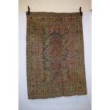 Melas rug, west Anatolia, 19th century, 5ft. 6in. X 3ft. 10in. 1.68m. X 1.17m. Overall wear, heavy