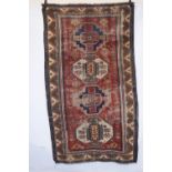 Kazak four-medallion rug, south west Caucasus, late 19th/early 20th century, 7ft. 11in. X 5ft.