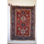 Kazak medallion rug, south west Caucasus, dated 1301 (AH) [1892 AD], 7ft. 11in. X 5ft. 8in. 2.41m. X