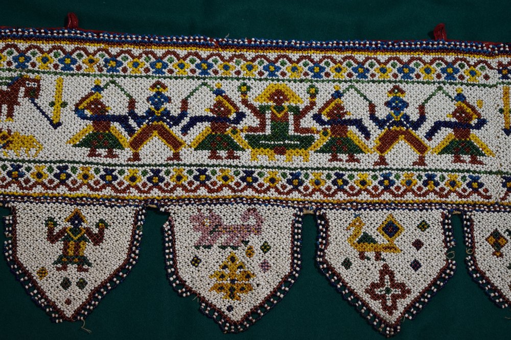 Rajasthan silk embroidered toran, north west India, circa 1930s-40s, 134in. X 17in. 340cm. X 43cm. - Image 4 of 14