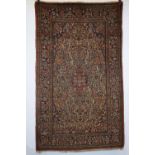 Kashan rug, west Persia, circa 1920s, 7ft. x 4ft. 2in. 2.13m. x 1.27m. Overall wear with some