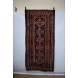 Luri long rug, Fars, south west Persia, early 20th century, 7ft. 10in. x 3ft. 10in. 2.39m. x 1.