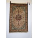 Tabriz rug, north west Persia, mid-20th century, 5ft. 4in. X 3ft. 6in. 1.63m. X 1.07m. Pale beige