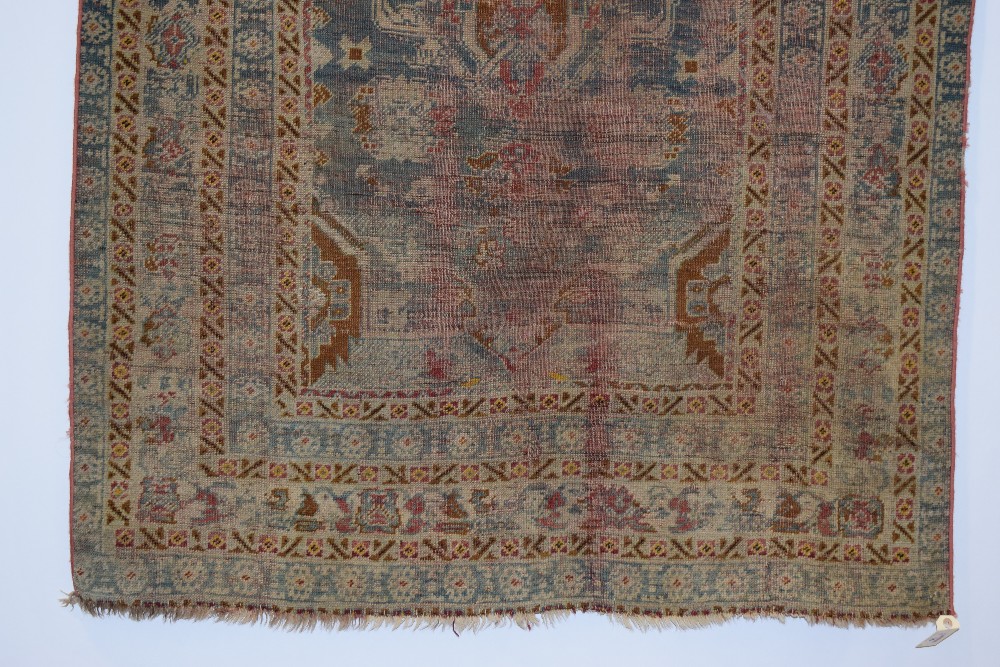 Melas rug, west Anatolia, 19th century, 5ft. 6in. X 3ft. 10in. 1.68m. X 1.17m. Overall wear, heavy - Image 6 of 11