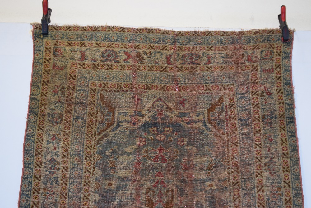Melas rug, west Anatolia, 19th century, 5ft. 6in. X 3ft. 10in. 1.68m. X 1.17m. Overall wear, heavy - Image 4 of 11