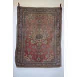 Tabriz rug, north west Persia, early 20th century, 6ft. X 4ft. 6in. 1.83m. X 1.37m. Overall wear.
