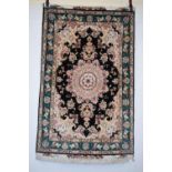 Tabriz signed part silk rug, north west Persia, last quarter 20th century, 5ft. 3in. X 3ft. 4in. 1.