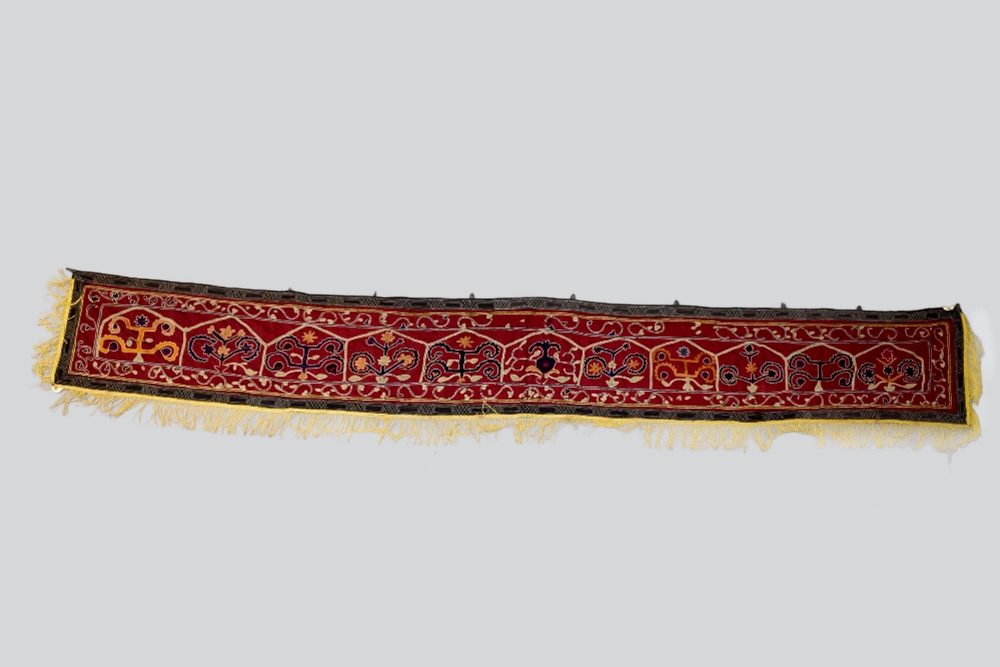 Uzbek red cotton silk-embroidered long door panel, Uzbekistan, first half 20th century, 119in. X