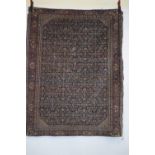 Senneh rug, Hamadan area, north west Persia, early 20th century, 5ft. 11in. X 4ft. 7in. 1.80m. X 1.